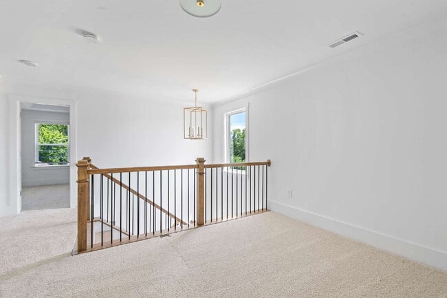 Building Photo - Experience Modern Comfort: Spacious 4-Bedr...