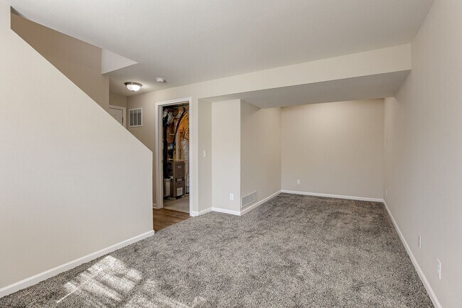 Building Photo - Bright & Spacious Elkhorn Home with Finish...