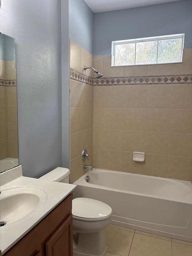 Building Photo - Beautiful 4-Bedroom Home in the Gated Water’s Edge Community/Lake Nona