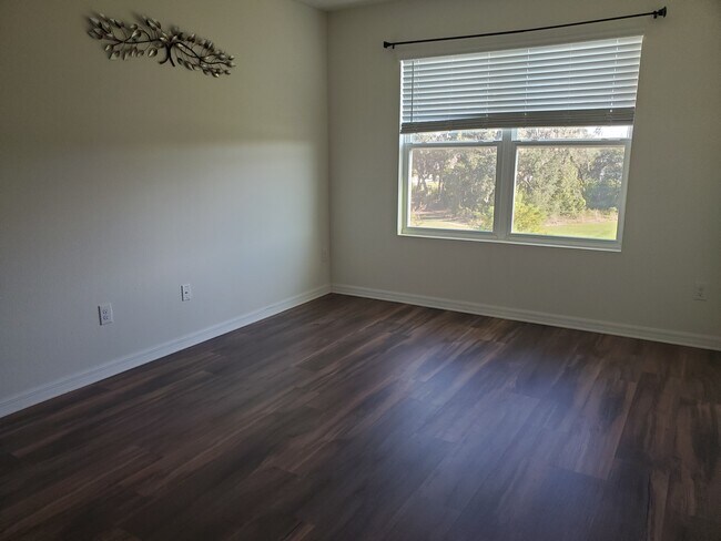 Building Photo - 6776 Wagon Trail St