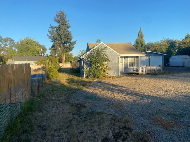 Building Photo - Cozy Single family home with two car garage and controlled access gate