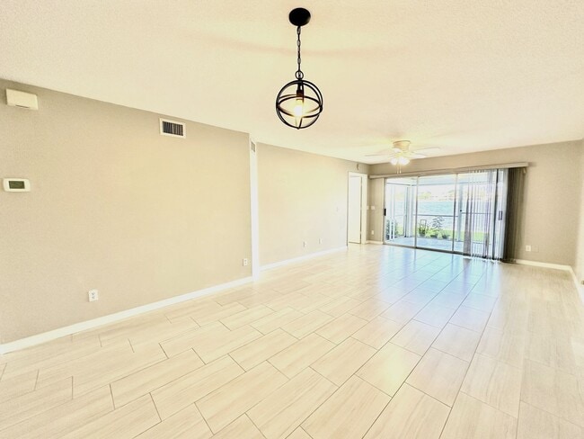 Building Photo - ** EMERALD LAKES ** 2 BED / 2 BATH CONDO - LAKE VIEW - CENTRAL NAPLES - ANNUAL RENTAL
