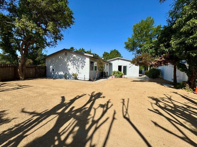 Building Photo - Newly Remodeled Gorgeous Open Floor Plan on a large Corner Lot