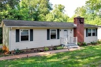 Building Photo - Single level living, backs to trees