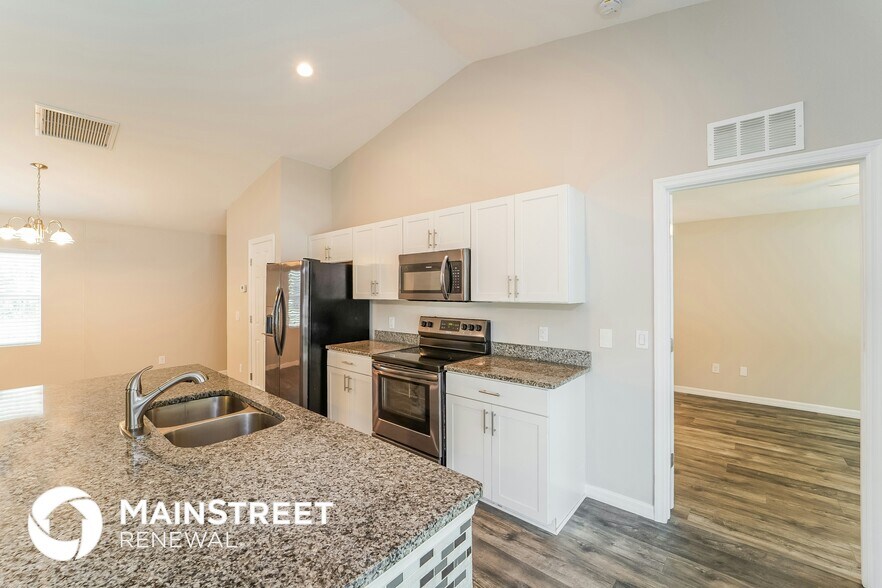 Building Photo - 5697 Babroff Terrace