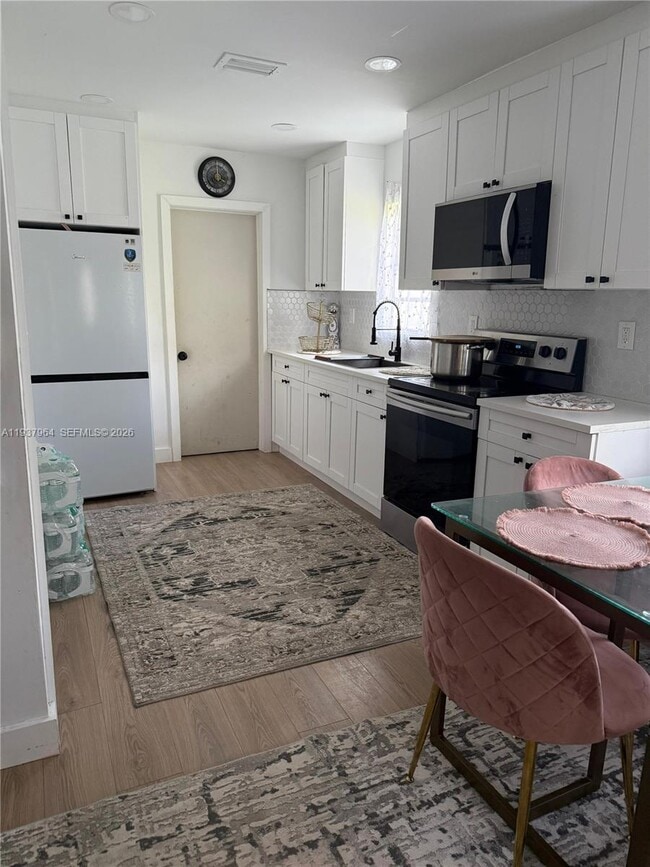 Building Photo - 5028 NW 3rd Ave