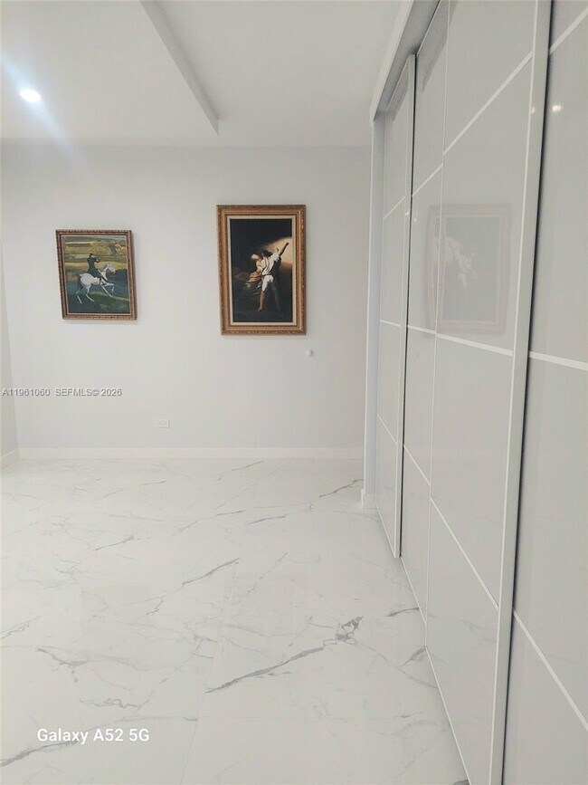 Building Photo - 5005 Collins Ave