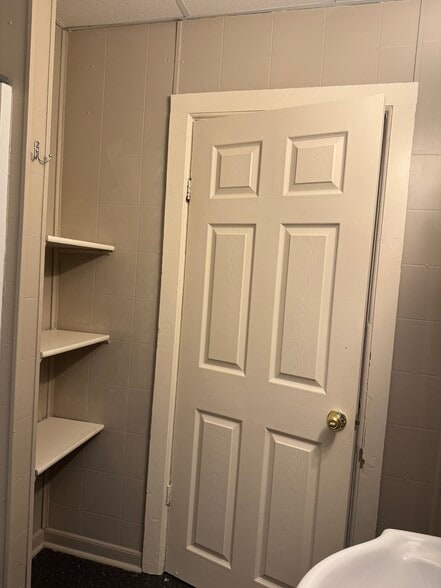 Bathroom shelving - 1413 Jefferson Ave