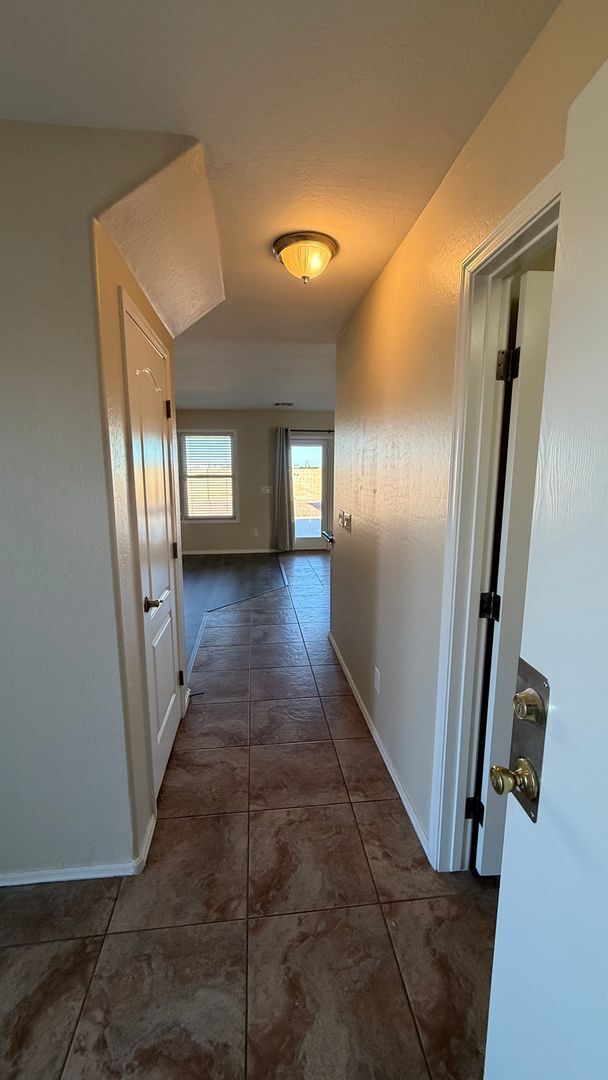 Building Photo - Spacious Surprise home with large backyard