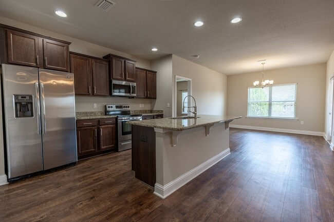 Building Photo - PRICE REDUCTION! + ONE FREE MONTH ON A 13 ...