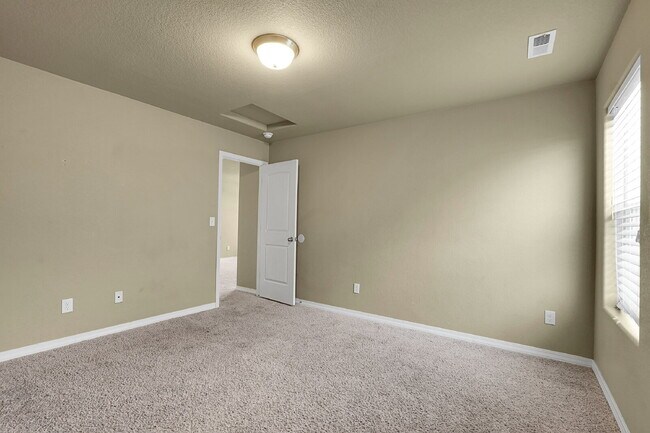 Building Photo - $2,490.95 - 4 Bed, 2.5 Bath Home in CO Springs with Fenced in Yard and 3 Car Garage!