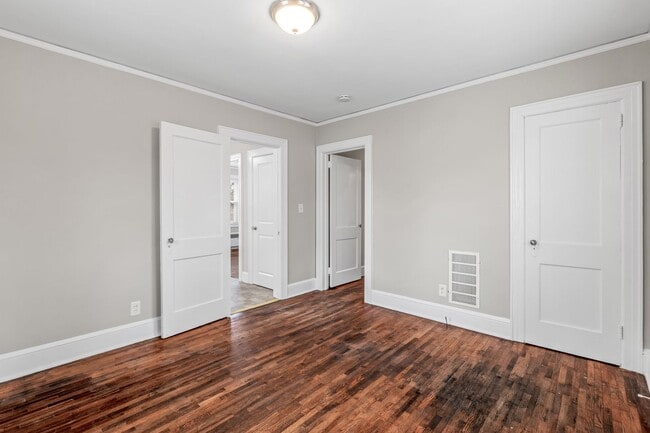 Building Photo - SW, Large Brick Two Bedroom PLUS Two Sun-Rooms, Hardwoods, LR & Separate DR, Fire Place!