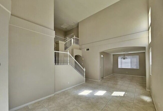 Building Photo - GATED SUMMERLIN HOME | 5 BEDROOM + DOWNSTAIRS DEN | 3-CAR GARAGE