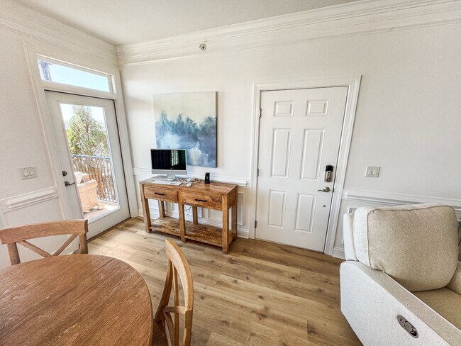 Building Photo - Fully Furnished Waterfront Elegance on Mai...