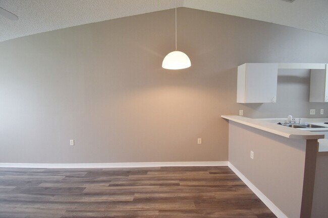 Building Photo - 2BR Patio Home with Open Layout, LVP Flooring, Private Fenced Yard, HOA Lawn Care & Convenient Bl...
