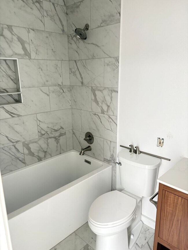 Building Photo - Completely Renovated 2 Bed 1.5 Bath West Pearl Street Condo W/Hiking Trails In Your Backyard.