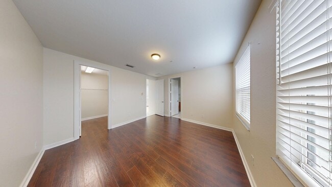 Building Photo - 4 Bed/3.5 Bath Townhome w/2 Car Garage in Pet Friendly Gated Community! ** Water/Cable/Internet I...