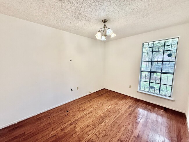 Building Photo - Charming 3BR/2BA Brick Home in Perkins Village – Spacious Yard & Cozy Fireplace