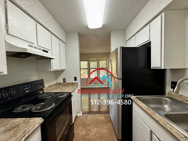 Building Photo - Available NOW: Majority of Utilities Paid and STEPS away from Campus