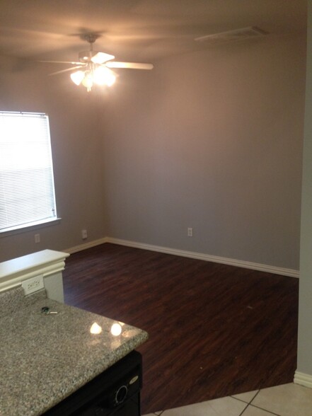 Living room next to kitchen - 7626 Anson Cir