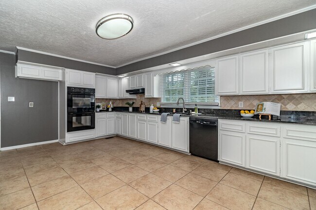 Building Photo - Beautiful and Updated 5 Bedroom Home