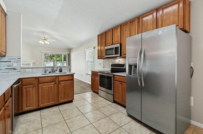 Building Photo - 1727 Canopy Oaks Dr