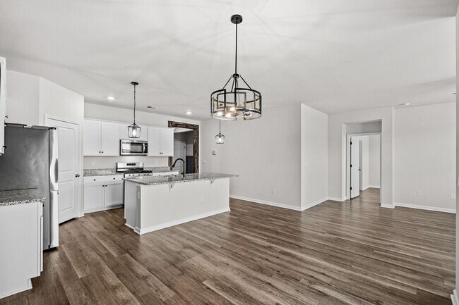 Building Photo - Modern 4BR Home with Screened Porch & Pond Views | Sun Colony, Longs SC