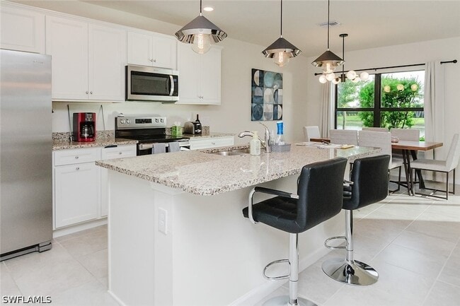 Building Photo - 6168 Harmony Dr