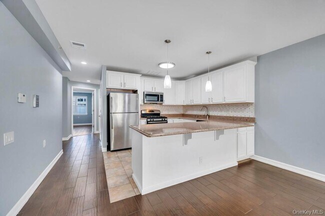 Building Photo - 102-20 Rockaway Beach Blvd