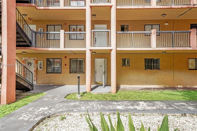 Building Photo - 5490 W 21st Ct