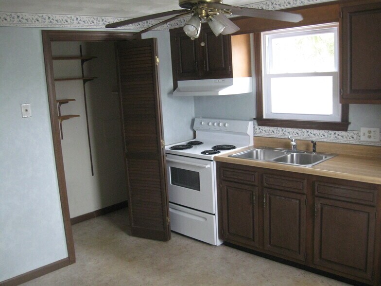 Kitchen with washer & dryer in utility closet to the left - 5 John Avenue