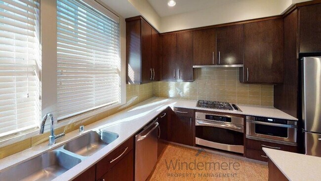Building Photo - Luxury Townhome located in the Vue 22 Comm...