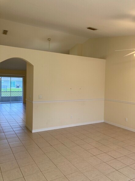 More living area with custom chair rail - 3224 SW 7th Pl