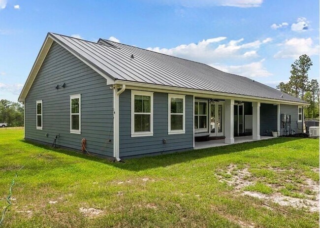 Building Photo - Gated 10-Acre Luxury Retreat with 40x60 Shop & Barn!
