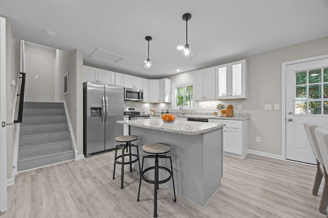 Building Photo - Charming 3-Bed Home with Granite Touches & Finished Basement in Raleigh!