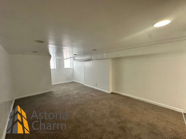 Building Photo - 3 Bedroom Home with Finished Basement and Rear Deck