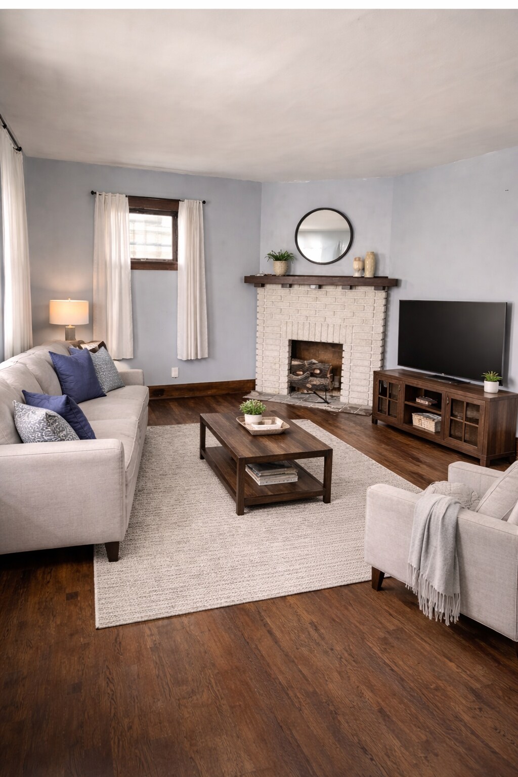 Living room w fake fireplace - 2041 Elbur Ave