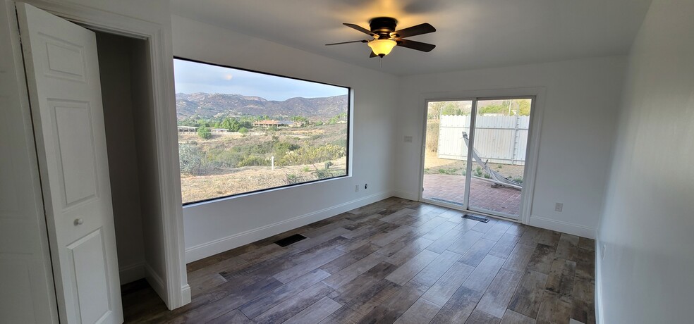 1st floor, Bedroom 2, private patio access and mountain views - 5513 Riggs Rd