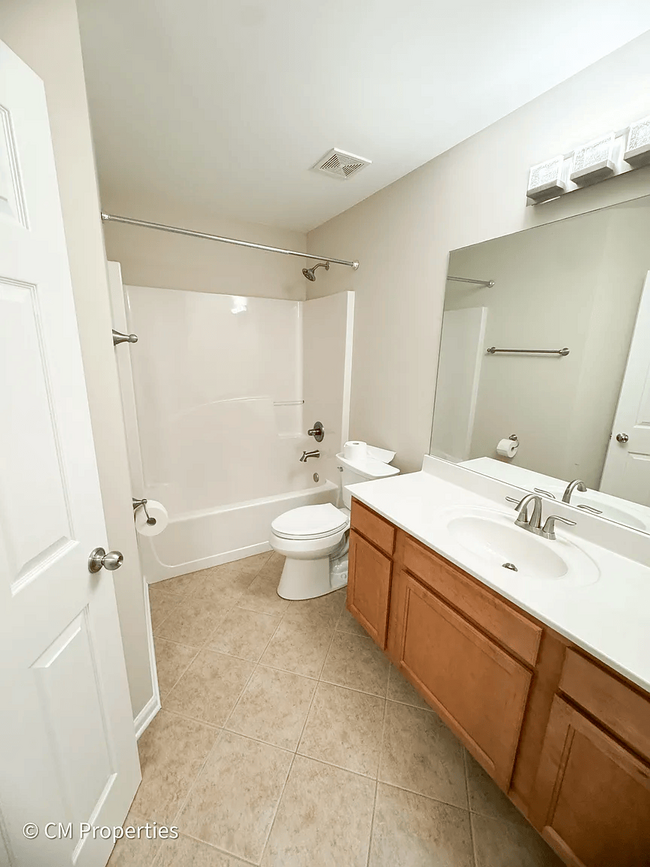 2nd full bathroom with Shower/Tub combo. Bedroom 3 to the left, Bedroom 2 across the hall. - 3968 Boston Common St