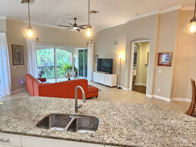 Building Photo - Annual Furnished or Unfurnished 3 Bedroom 2 Bathroom Second Floor Condo in Venetian Golf & River ...