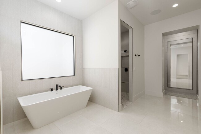 Building Photo - Gorgeous Custom Single Story with RV Garage