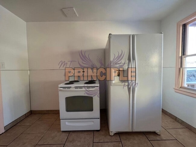 Building Photo - 403-405 1/2 W Granite