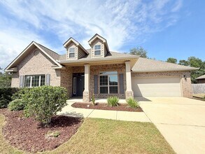 Building Photo - Spacious 5-Bedroom Home - Heart of Pace