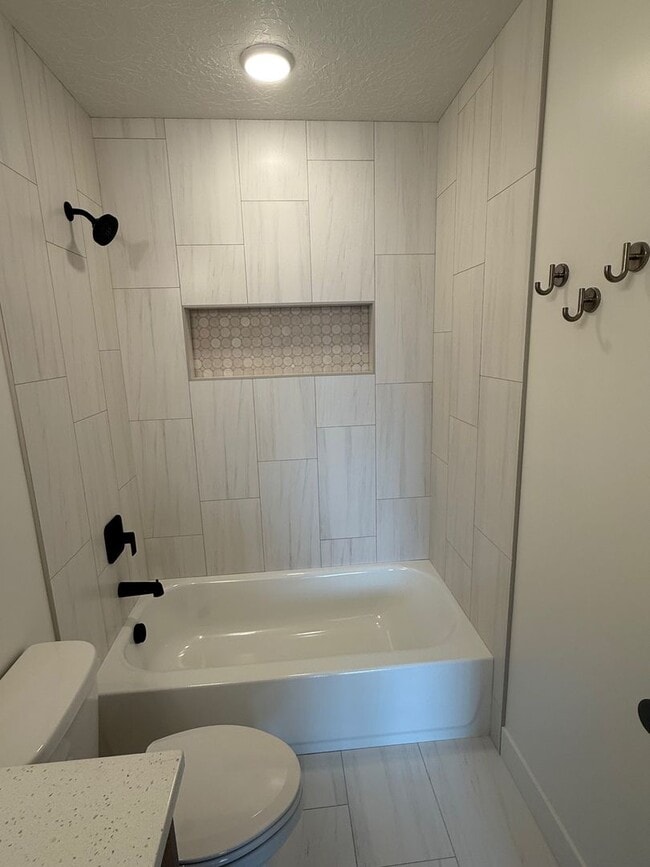 Building Photo - Half off first months rent - Beautiful townhome with 2 car garage, Central Air and Master Suite