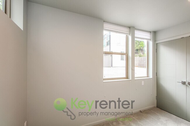 Building Photo - Modern 3 Bedroom with Rooftop Deck and In Unit Laundry