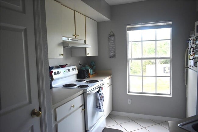 Building Photo - 9078 Lake Chase Island Way