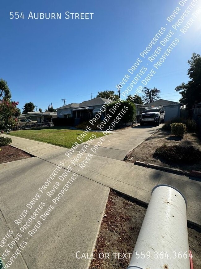 Building Photo - PRICE DROP- Spacious Vintage Beauty in Tulare