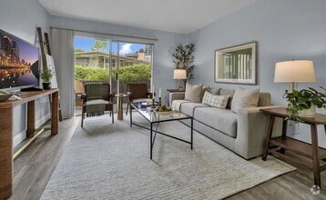 Building Photo - Turnkey ground floor condo in the coveted ...