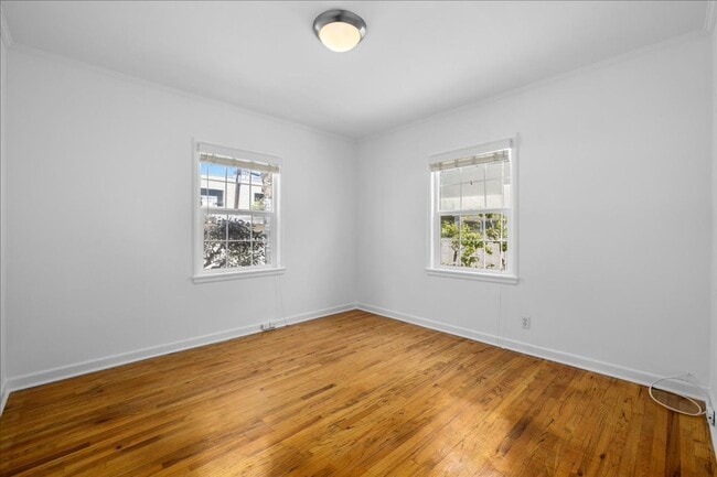 Building Photo - Corner lot home on a classic tree lined Beverly Hills street