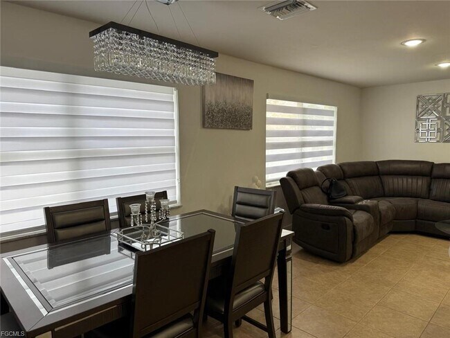 Building Photo - 1335 NE Pine Island Rd